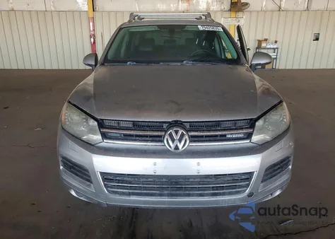 2011 Volkswagen Touareg Hybrid from USA, damaged, VIN WVGFG9BP5BD001253